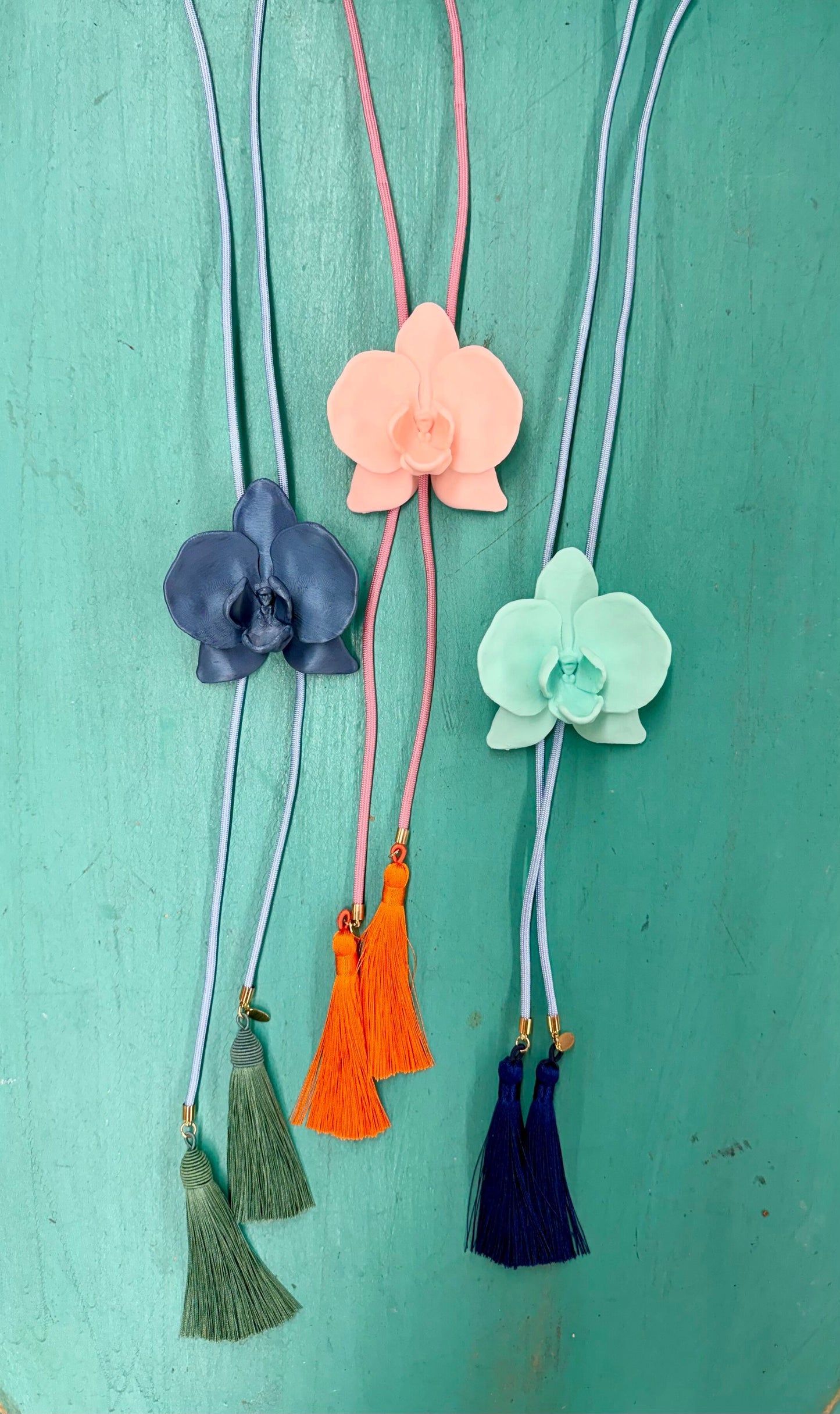 Orchid Flower Bolo With Tassels