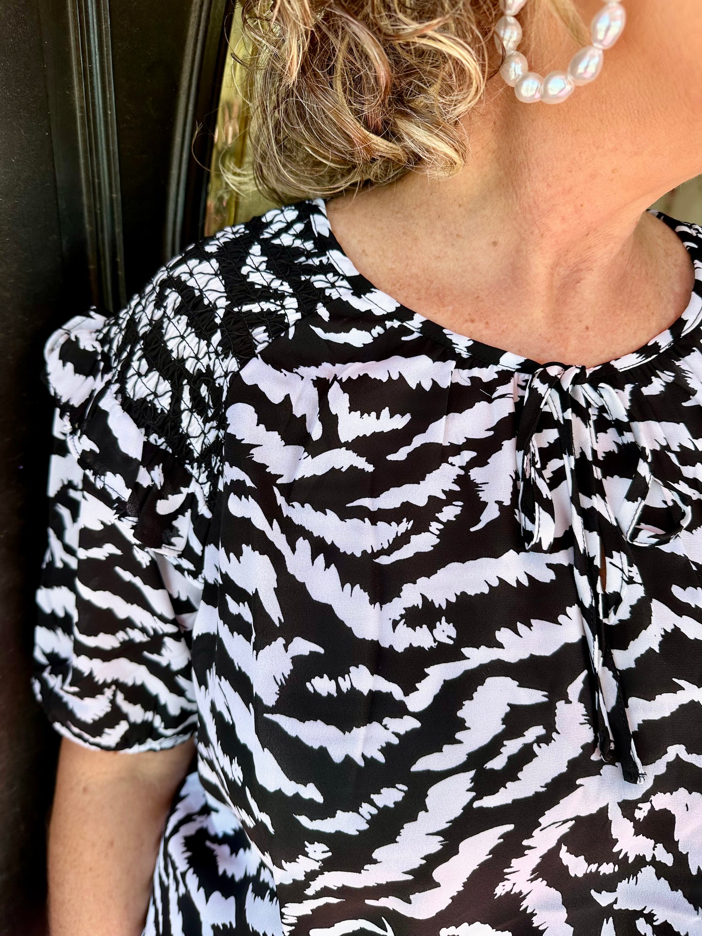 Zebra Ruffle Tie Neck Top